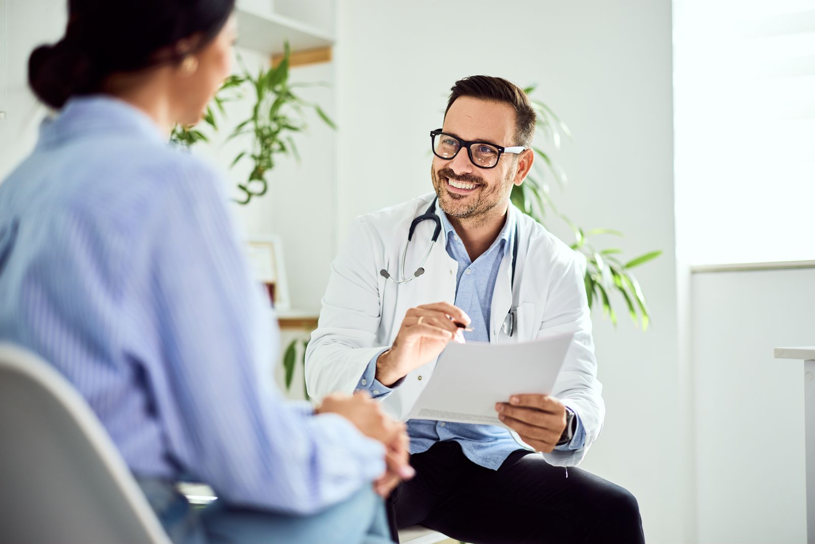 A physician at their desk